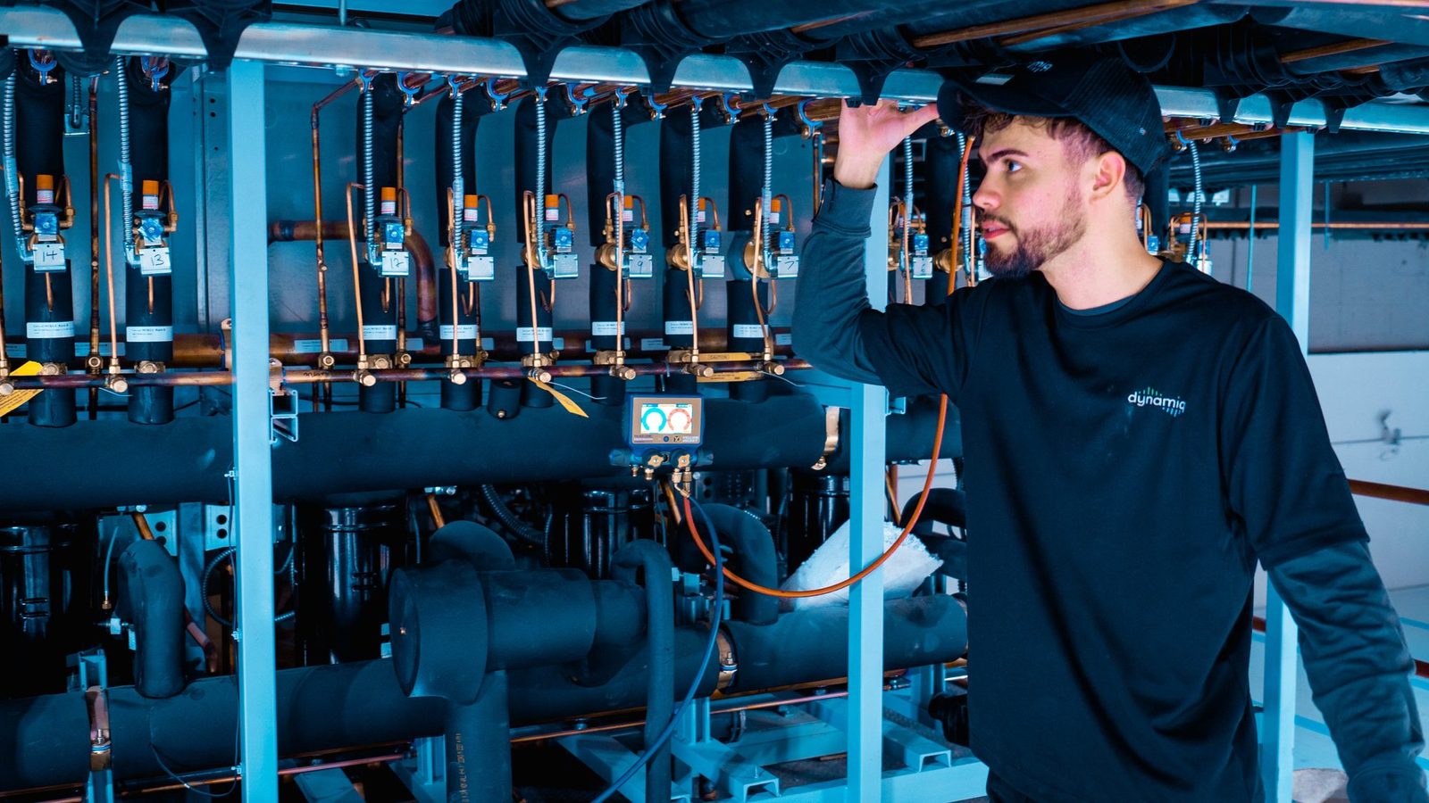 Compressor rack in a supermarket machine room monitored to cut energy costs